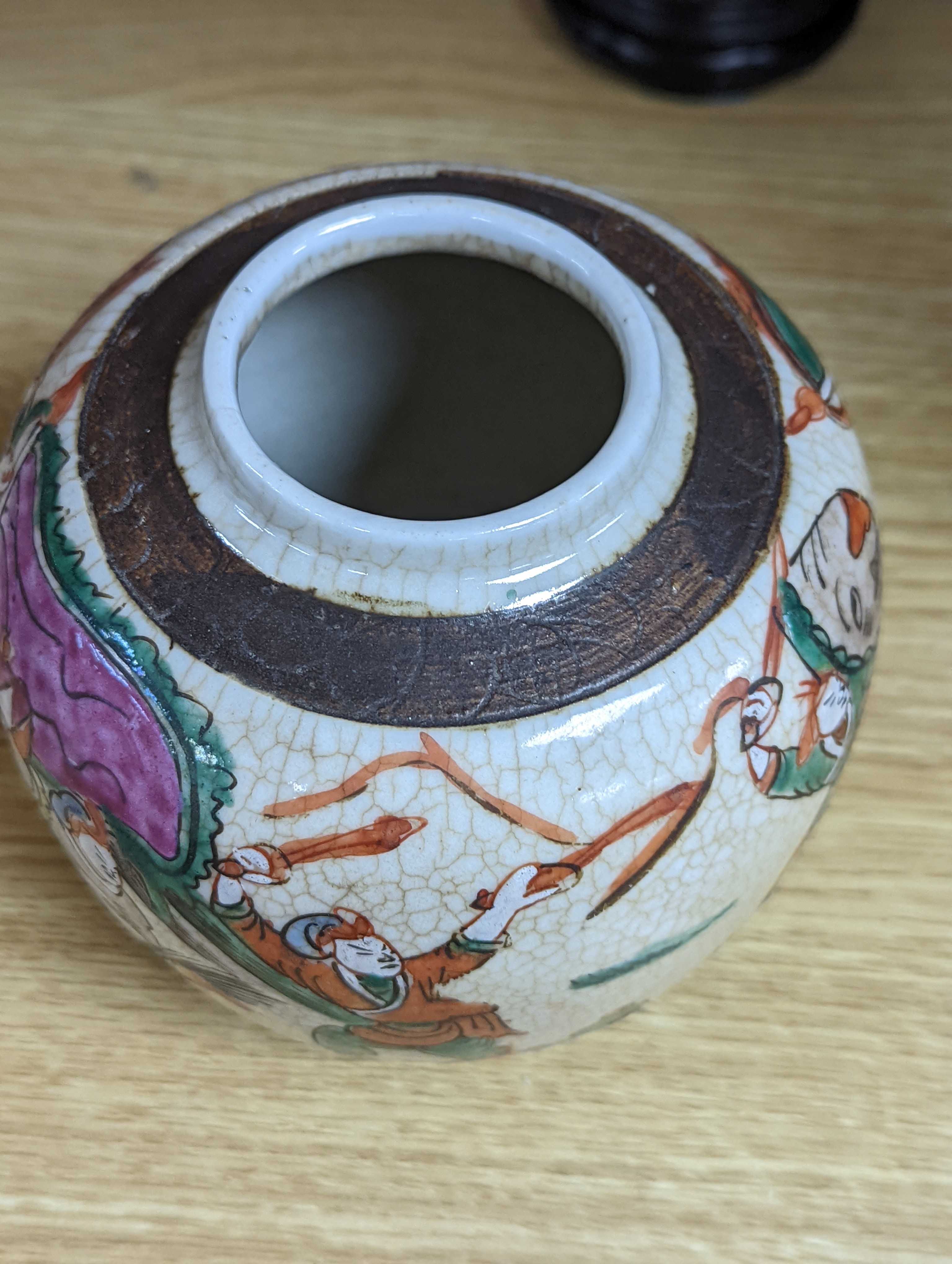 A Chinese famille verte crackle glaze jar and cover, 14.5cm, two famille rose dishes and a crackle glaze ‘dragon’ vase, all late 19th/early 20th century